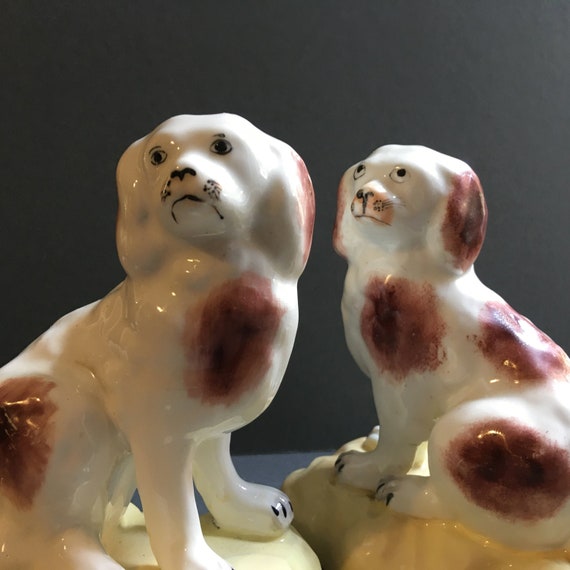 An oh so Charming  Pair of Early Porcelain Staffordshire Spaniels by Samuel Alcock