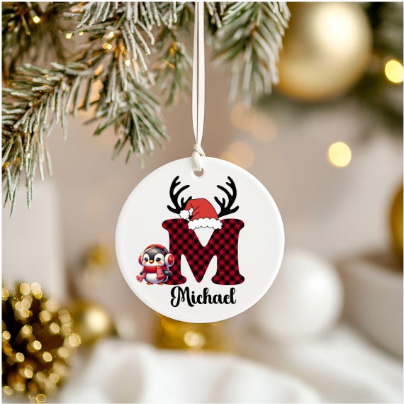 Monogrammed Ornament - Add a name and initial - With a penguin, santa hat, and reindeer antlers - Personalized for everyone in the family
