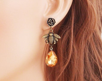 Surgical steel bee, flower and amber earrings, golden bronze bee post stud earrings, long dangle drop earrings. Amber earrings