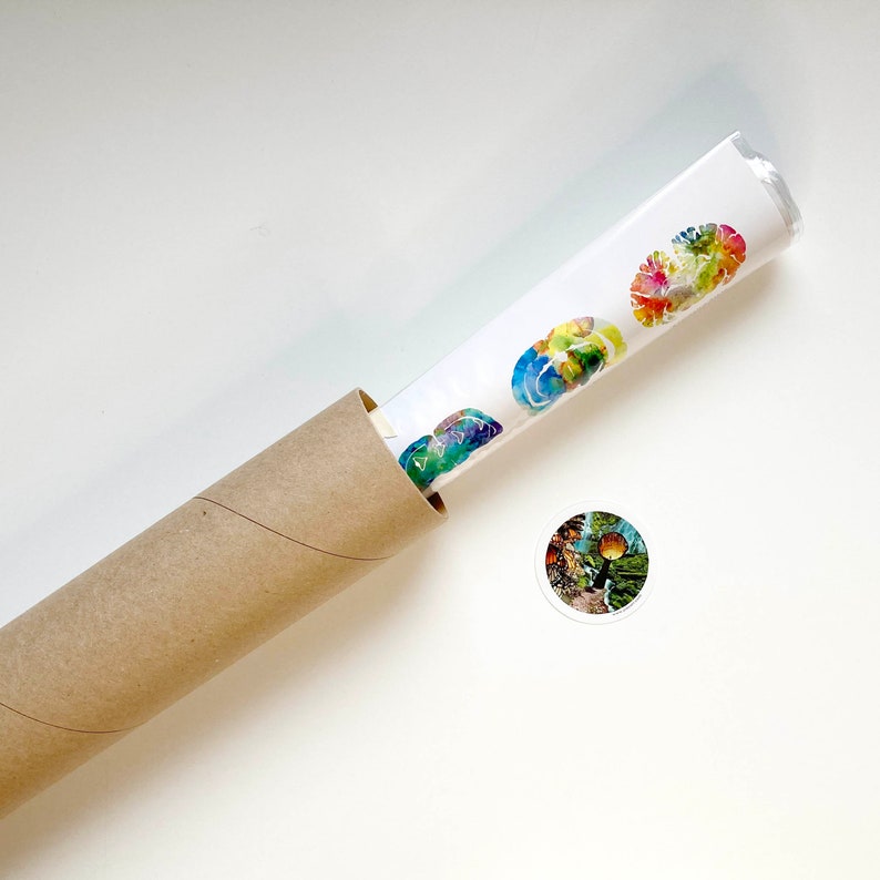 May include: A brown cardboard tube with a white paper roll inside. The paper roll features colourful watercolour designs of flowers. A separate sticker with a watercolour design of a flower is also included.