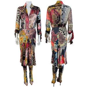 May include: A long-sleeved midi dress featuring a vibrant patchwork design with mixed patterns including leopard print, paisley, and floral motifs in shades of red, yellow, black, and gold. The dress has a collared neckline and tie-cuff sleeves.