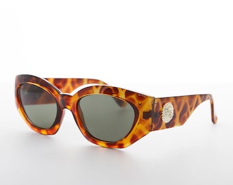 Occhiali da sole Cat Eye con stemma dorato anni '90 - Diva