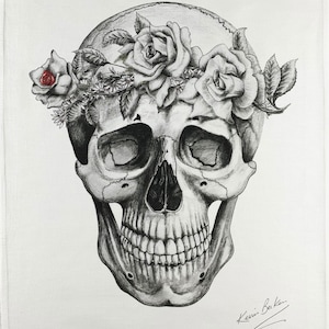 May include: A monochrome pencil drawing of a human skull, decorated with a floral crown of roses and foliage. The skull's teeth are visible, and the artist's signature is in the lower right corner.