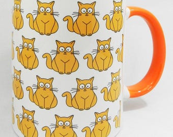 The Ginger Cat with the big eyes Mug with orange inner and handle