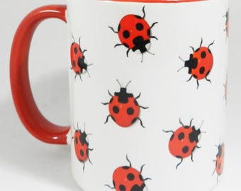 Multitude of Ladybirds Mug with red Glazed Handle and Inner
