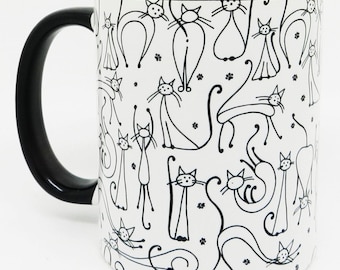 The Contented Cats Mug with glazed black handle and inner