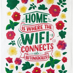 May include: White kitchen towel with a floral design and the text "HOME IS WHERE THE WIFI CONNECTS AUTOMATICALLY" in green and red. The towel is decorated with red, yellow, and green floral illustrations.