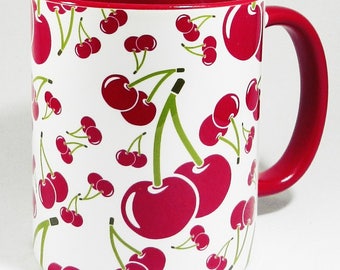 The Red Cherries Mug with glazed red handle and inner