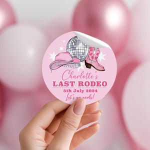 Personalised hen party stickers pink cowgirl disco last rodeo theme, fast UK shipping, gloss finish high quality stickers for your party bags, shot bottles and favours with cowgirl boots, hat and disco ball.