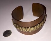 Copper Cuff Bangle Bracelet with a Raised 3D Brass Roped Design Top on a Handmade Jewelry Creation for a Bold Beautiful Look interior Marks