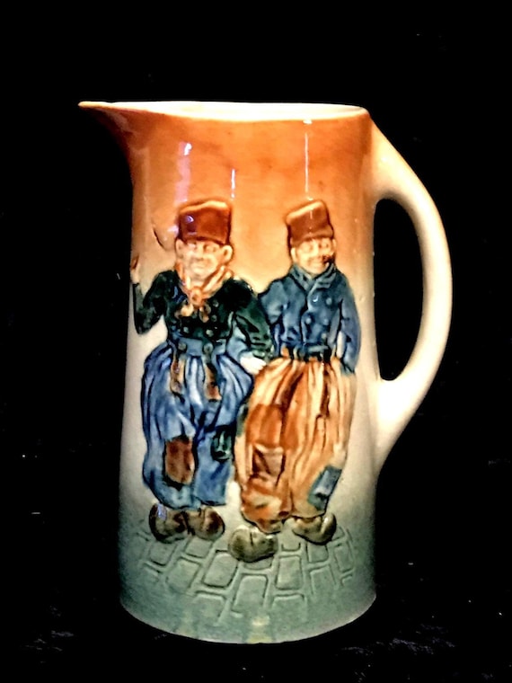 Glazed Stoneware Pitcher Antique Pottery Tankard Jug Featuring 3-D Raised Figures Design