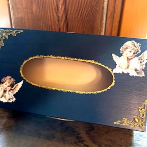 Tissue box with cherubs