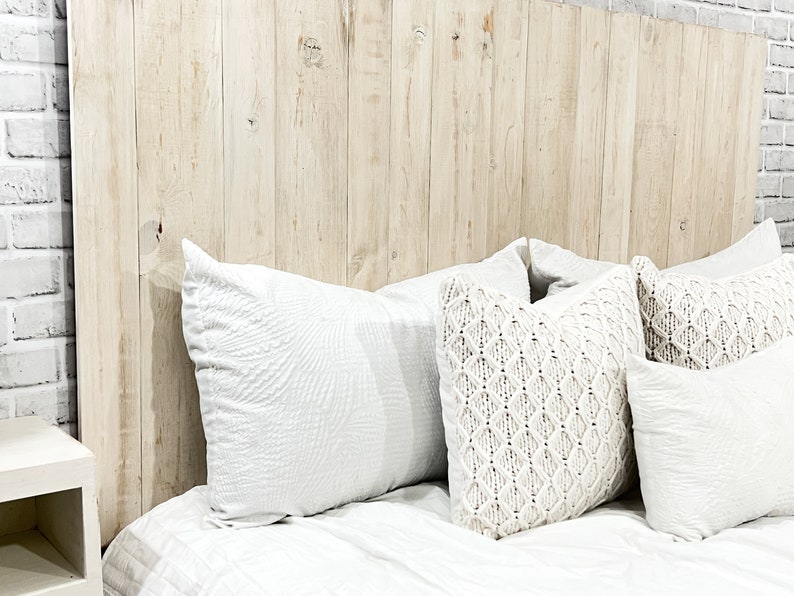 California King size headboard compatible with adjustable bed. Made with vertical wooden pallet boards, tinted with an antique white chalk paint. Farmhouse and Cottage home decor style.