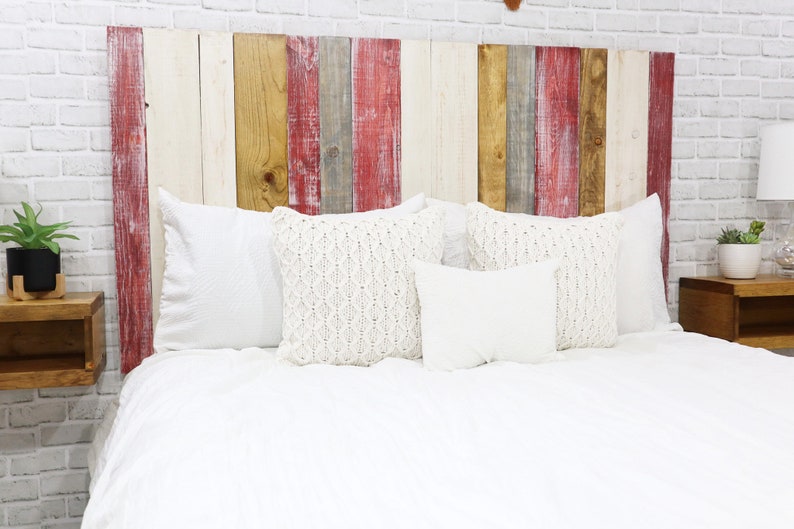 Twin Rustic wood headboard with vertical slats multicolored with redwash, golden brown, antique white and graywash colors, paired with a golden brown wood stain matching floating nightstands.