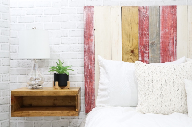 Queen size leaner style headboard built with wood slat with golden brown, antique white, redwash and graywash finish boards, paired with a minimalist golden brown stain matching floating nightstand