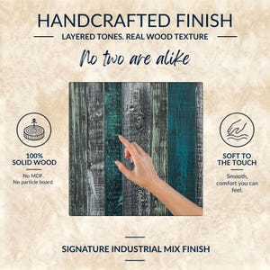 May include: A square wooden panel featuring a signature industrial mix finish with vertical planks in shades of teal, black, and grey. Text includes HANDCRAFTED FINISH, LAYERED TONES. REAL WOOD TEXTURE, No two are alike, 100% SOLID WOOD, and SOFT TO THE TOUCH.