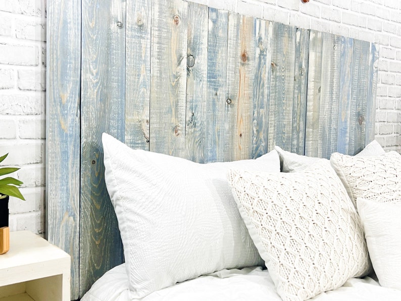 California King size headboard compatible with adjustable bed. Made with vertical wooden pallet boards, tinted with a blue stained, color-washed with white chalk paint. Farmhouse and Cottage home decor style.