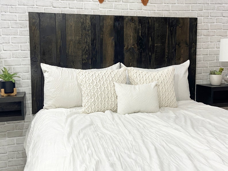 Modern Rustic wood twin headboard style with vertical slats in a black wood stain grain finish. Paired with matching floating nightstands in a black wood stain.