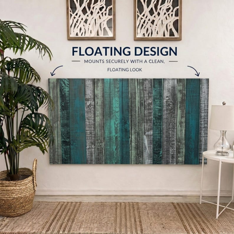 May include: A rectangular wall art piece featuring a vertical plank wood pattern in shades of teal, dark green, and grey. The text FLOATING DESIGN MOUNTS SECURELY WITH A CLEAN, FLOATING LOOK is printed above the artwork, which is mounted on a white wall.