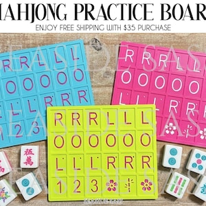 May include: Three colorful Mahjong practice boards in blue, pink, and yellow, with matching tiles. The boards feature the letters R, L, and O, along with numbers and floral designs. The text "MAHJONG PRACTICE BOARD" is at the top.