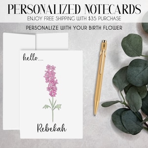 May include: Personalized notecards with a pink flower illustration and the text "hello... Rebekah".