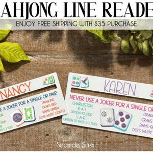 May include: Two white Mahjong line readers with the names "Nancy" and "Karen" printed on them. Each reader has game instructions and decorative Mahjong tiles. The text "Mahjong Line Reader" is at the top.