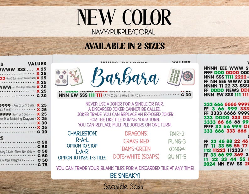 May include: A Mah Jongg score card featuring the name Barbara in blue script, surrounded by game rules, tile illustrations, and point values in black, red, green, and purple text. The card includes sections for winds, dragons, and Charleston instructions.