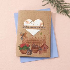 Tarjeta de semillas plantables en el jardín