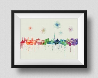 May include: A watercolor painting of a city skyline with fireworks exploding in the sky. The city is depicted in a rainbow of colors, with the buildings and the sky painted in shades of red, orange, yellow, green, blue, indigo, and violet. The fireworks are white and yellow.