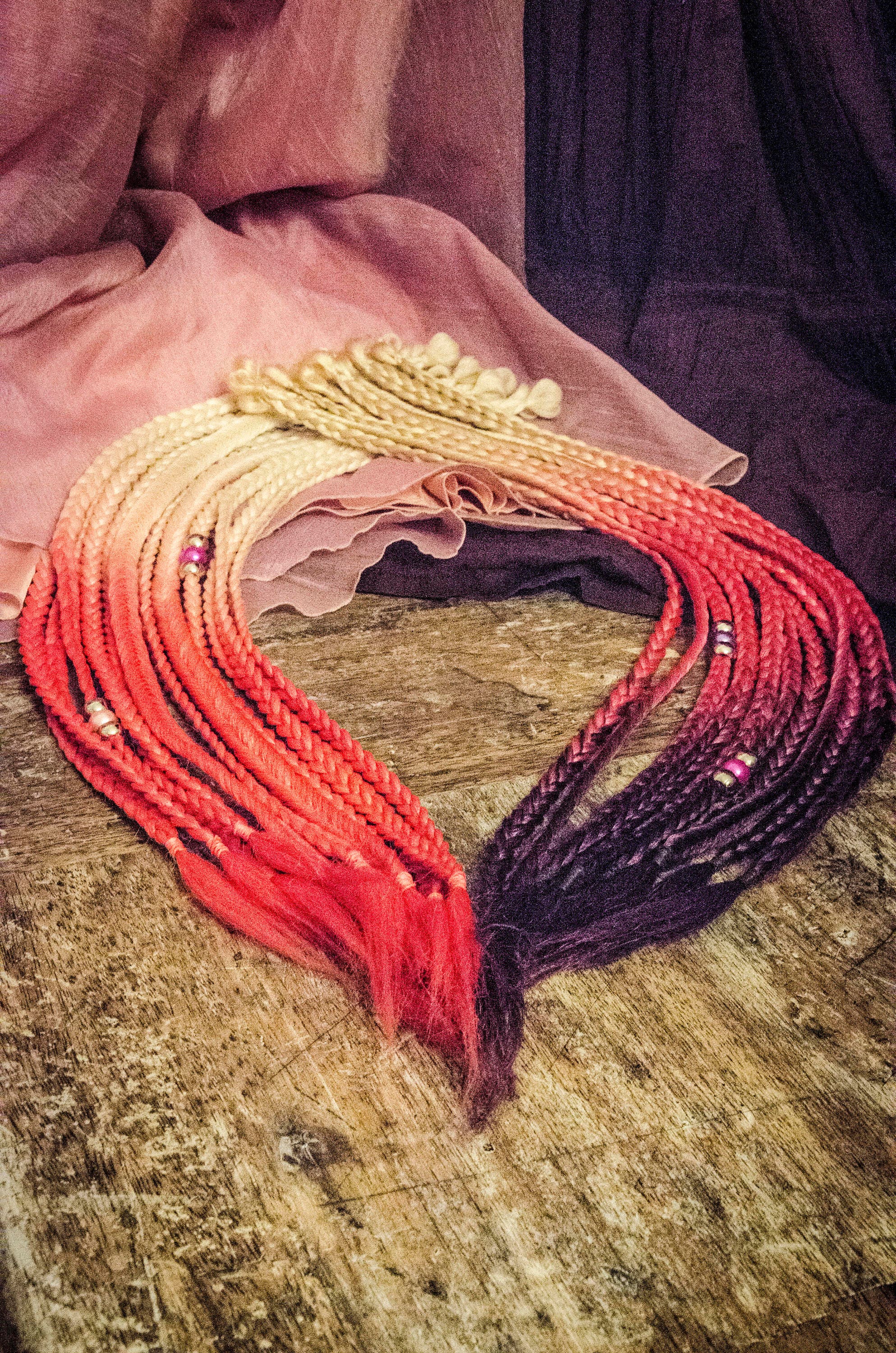 Single ended synthetic braids, ombre blonde-pink-purple accent kit: 12 SE synthetic braids, 25 inches. Shipping to the UK from abroad