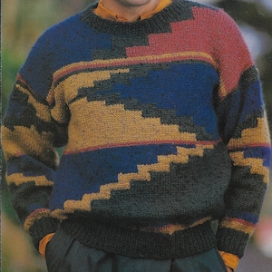 May include: A knitted sweater with a geometric pattern in shades of blue, green, yellow, and red.