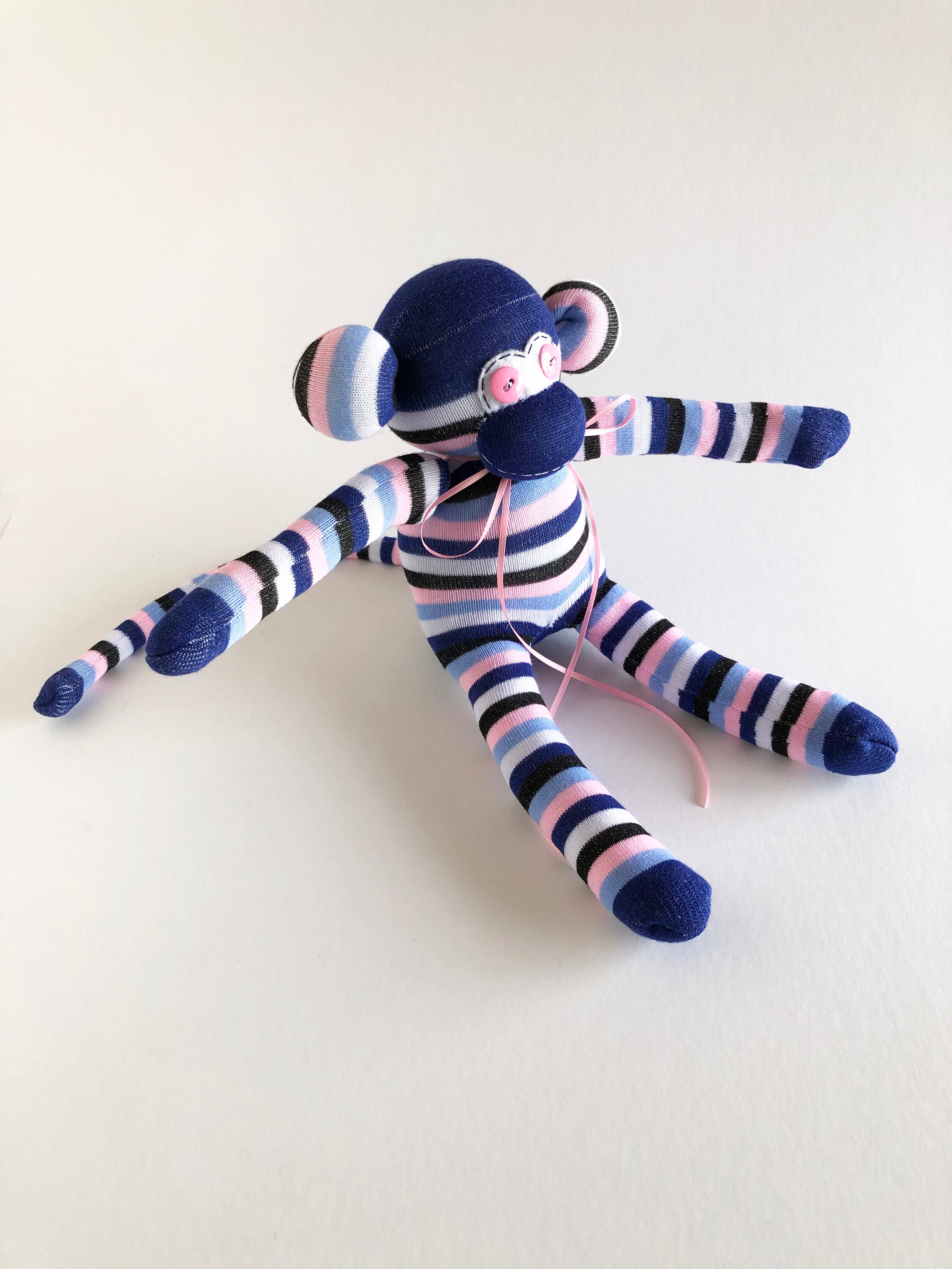 white monkey stuffed animal