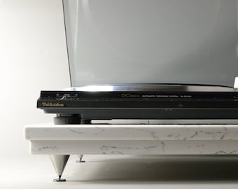 Attica White Caesarstone Turntable Stand with Brass Spikes