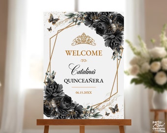 May include: A welcome sign for a Quinceañera with a gold geometric frame and black floral accents. The text reads "Welcome to Catalina's Quinceañera 06.15.20XX".