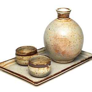 Sake set. Sake. Ceramic. Barware. Dinnerware. Japanese aesthetic. Bottle. Tray. Set. Drink.