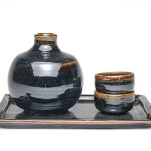 Sake set. Sake. Ceramic. Barware. Dinnerware. Japanese aesthetic. Bottle. Tray. Set. Drink.