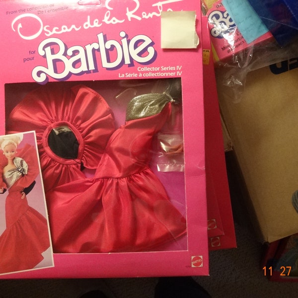 Barbie doll, Oscar del la Rent outfit,  1984, Collector Series IV, mint in box, glamorous red with big gold bow,  #9258,diagonal skirt .