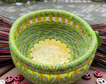 Groovy "Here Comes The Sun" pine needle and sweetgrass basket with bright yellow and orange sea glass beads and a cool sunny ceramic base.