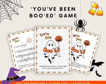 May include: A Halloween-themed printable game set with the text "You've Been Boo'ed Game." The design includes a ghost holding a pumpkin balloon, a witch's hat, a spider, and candy corn. The game includes instructions.