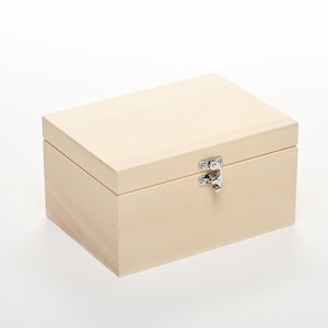 May include: A light wood box with a hinged lid and a silver latch.