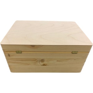 May include: A plain wooden box with a hinged lid. The box is made of light wood and has a natural finish. The hinges are made of brass.