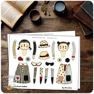 Puede incluir: Una hoja de papel con ilustraciones de partes de mu&ntilde;ecas, incluyendo cabezas, brazos, sombreros y ropa. Los dise&ntilde;os incluyen lunares, rayas y detalles florales. El texto "Curious Ladies" es visible.