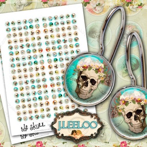 May include: Two silver shower curtain hooks with a round, turquoise glass charm featuring a skull with a floral crown. The charm has a vintage, distressed look and the text "ADORABLE" is visible on the charm.