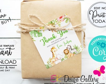 May include: A brown paper-wrapped gift with a jungle-themed thank you tag. The tag features watercolor illustrations of a giraffe, elephant, lion, and zebra. The tag is tied with twine. Text on the tag reads "Thank You" and "For coming and celebrate with me".