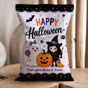 May include: A rectangular snack bag with a light purple background featuring the text Happy Halloween and From your friend, Anna. The design includes a white ghost with a purple bow, an orange jack-o'-lantern, and a witch holding a broomstick.