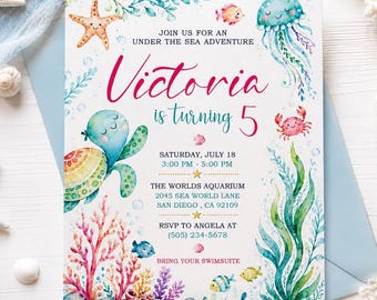 May include: A rectangular invitation card featuring watercolour illustrations of sea life including a turtle, jellyfish, crab, starfish, and coral. The text reads: Join us for an under the sea adventure, Victoria is turning 5, Saturday, July 18, 3:00 PM - 5:00 PM, The Worlds Aquarium, 2045 Sea World Lane, San Diego, CA 92109, RSVP to Angela at (505) 234-5678, Bring your swimsuit.