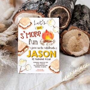 May include: A white invitation card with a watercolor illustration of a campfire, marshmallows, and graham crackers. The text reads "Let's Have S'more Fun" and "Join us to celebrate Jason is turning four".