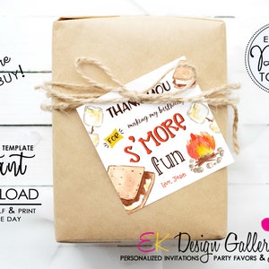 May include: A brown paper gift bag with a white tag tied with twine. The tag has a watercolor illustration of a s'more and a campfire with the text "Thank you for making my birthday s'more fun."