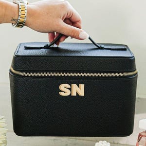 Shadow Monogram Leather Train Case