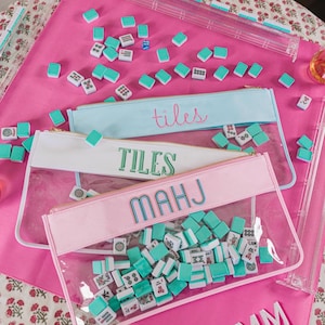 a table topped with lots of pink and blue items